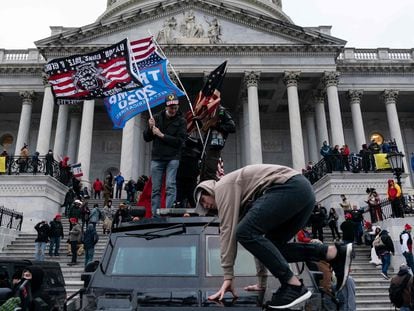 supporters of former president Donald Trump protest outside the U.S. Capitol in Washington, DC.