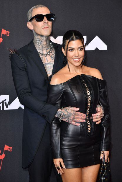 Travis Barker and Kourtney Kardashian pose on the red carpet of the MTV Video Music Awards at the Barclays Center in New York, September, 2021.