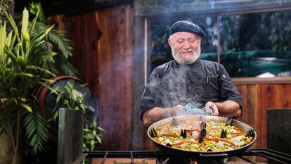 Vicente Aguilar Cerezo makes rice with vegetables and seafood.