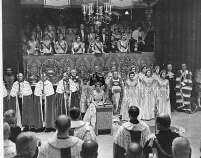 Queen Elizabeth II amongst dignitaries and ladies-in-waiting during her Coronation ceremony in Westminster Abbey, London.  