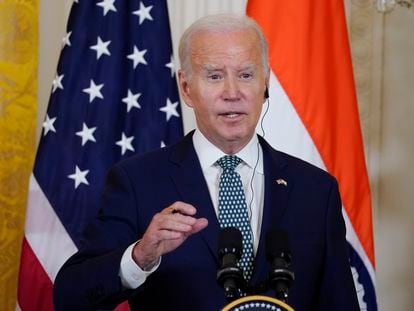 President Joe Biden speaks during a news conference in the East Room of the White House