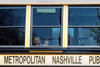 A child weeps while on the bus leaving The Covenant School following a mass shooting at the school in Nashville, Tennessee, on March 27, 2023.