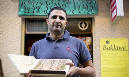 Abud Alkarmi outside his Madrid pastry store, Pim Pam Pum.