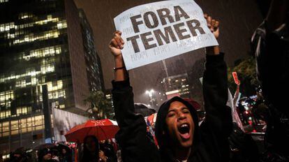 A protester calls for the resignation of Brazilian president Michel Temer in 2017.