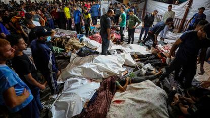 Wounded Palestinians lay at the al-Shifa hospital, following Israeli airstrikes, in Gaza City, central Gaza Strip, Tuesday, Oct. 17, 2023.