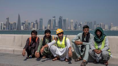 Pakistani migrant workers take a break in Doha, Qatar on Wednesday.