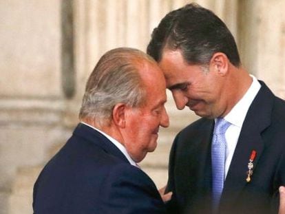 Emeritus king Juan Carlos and his son Felipe in a file photo.
