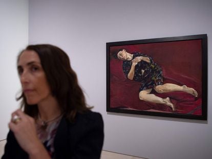 A visitor near 'Love' (1995), by Paula Rego, at the exhibition in the Museo Picasso, Malaga.