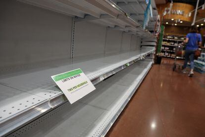 Empty bottled water shelves in a supermarket in Tampa, Florida.