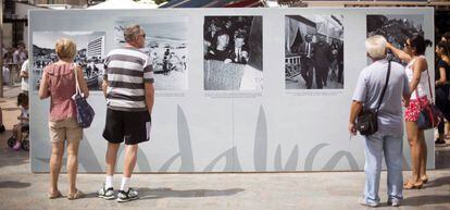 Visitors inspect an open-air tourism exhibition in Torremolinos.