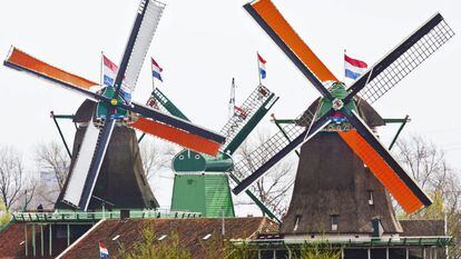 Mills decorated with orange motifs by their owners during the investiture of King Willem-Alexander and his wife, Queen consort Máxima, in Amsterdam, Netherlands.