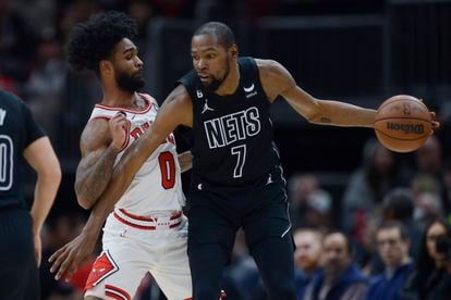 Brooklyn Nets' Kevin Durant (7) looks to drive against Chicago Bulls' Coby White (0) during the second half of an NBA basketball game Wednesday, Jan. 4, 2023, in Chicago.