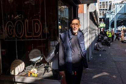 John Quinones runs a store selling second-hand goods and gold. He has been working in the store for 45 years and has witnessed the decline of the surrounding streets in recent years.