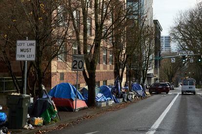 Tents line a sidewalk in Portland, december 2020, when a record number of homeless deaths were driven by meth and fentanyl.