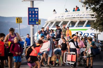 Passengers board a ferry in Vigo, headed for the Cies Islands.