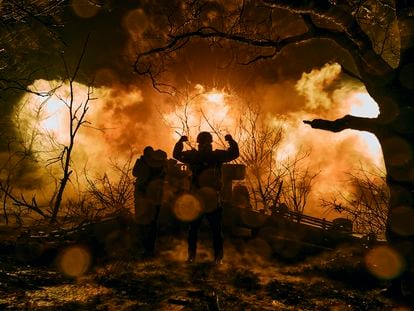 Ukrainian soldiers fire artillery at Russian positions near Bakhmut, in the Donetsk region of Ukraine, on Nov. 20, 2022.