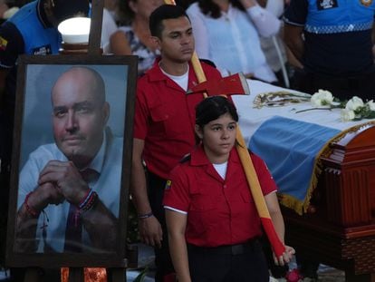 Firefighters guard the coffin of Manta Mayor Agustín Intriago, who was murdered in July 2023.