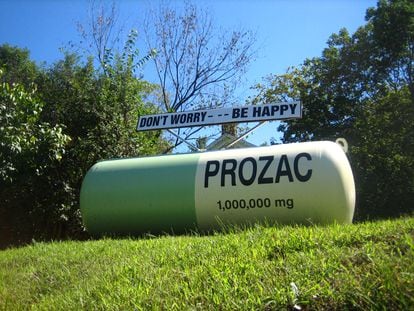 An advertisement for Prozac reads 'Don't worry, be happy', in New York, in an undated image.