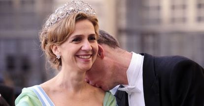 Iñaki Urdangarin kisses his wife Cristina at a royal wedding in Sweden in 2010.