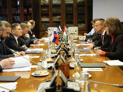 Alexey Likhachev, Director General of State Atomiс Energy Corporation Rosatom, and Peter Szijjarto, Minister of Foreign Affairs and Trade of Hungary, talk during their meeting in Moscow, on April 11, 2023.