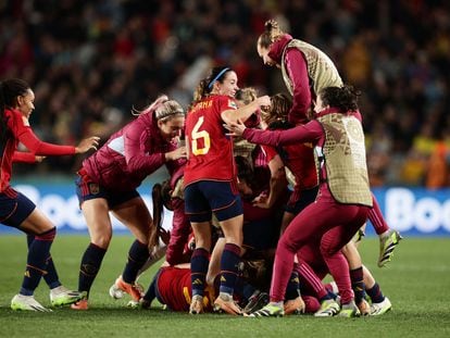 Spain's Olga Carmona celebrates scoring their second goal with teammates.