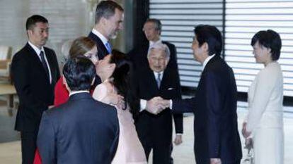 Spain’s Queen Letizia (in red) raised eyebrows when she broke protocol to kiss Masako, the Crown Princess of Japan during a recent visit to the Asian country.
