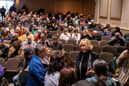 Environmental activist Erin Brockovich (C-R) speaks to concerned residents as she hosts a town hall on February 24, 2023 in East Palestine, Ohio.