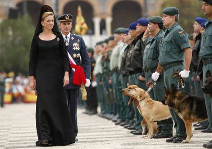 Princess Cristina inspects troops during an official event in Seville in 2008.
