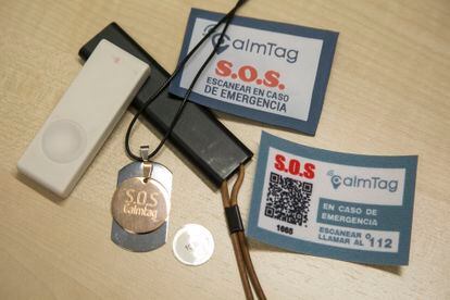 Two locator devices; a necklace with a GPS medallion; a small NFC sensor disc that goes inside a tag; and a QR sticker with personal information. 