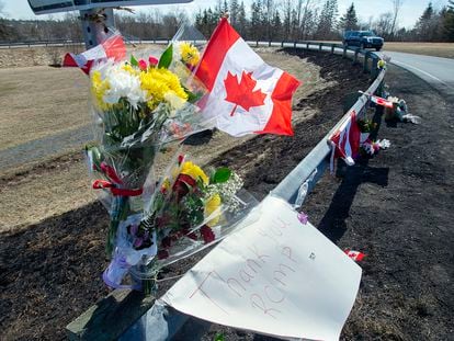 FILE - A memorial pays tribute to Royal Canadian Mounted Police Constable Heidi Stevenson, a mother of two and a 23-year veteran of the force, along the highway in Shubenacadie, Nova Scotia, on Tuesday, April 21, 2020. A public inquiry has found widespread failures in how Canada’s federal police force responded to the country’s worst mass shooting, Thursday, March 30, 2023. It recommends that the government rethink the Royal Canadian Mounted Police’s central role in Canadian policing.   (Andrew Vaughan/The Canadian Press via AP, File)