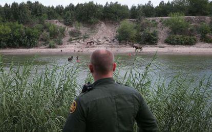 An officer on patrol along the US-Mexico border in Texas.