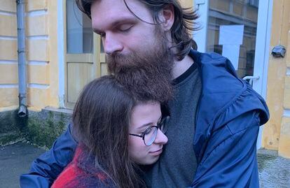 Ilia Samoilenko hugs his girlfriend, Dariia Tsikunova, at a hospital in Chernihiv after being released by Russian forces.