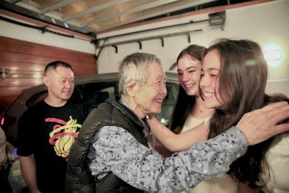Alberto Fujimori greets family members on December 6 in Lima after his release from prison. 