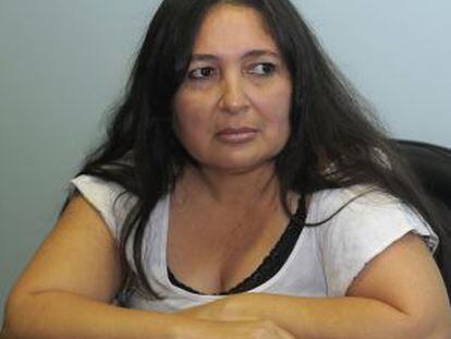 Narcisa Delacruz speaks to reporters on Tuesday.