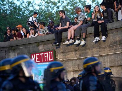 Police patrol as youths gather on Concorde square during a protest in Paris on Friday.