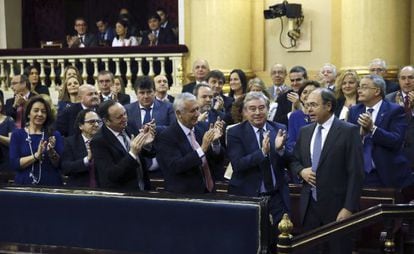 PP Senator Pío García Escudero (first row on right) applauds after he is re-elected Senate speaker.
