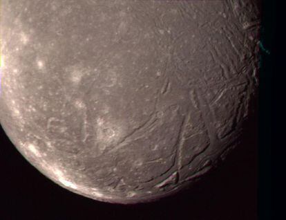 The lunar surface of Ariel, one of Uranus's moons, photographed by 'Voyager 2'.