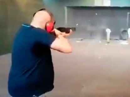 A screenshot of the man firing at images of members of the Spanish government.
