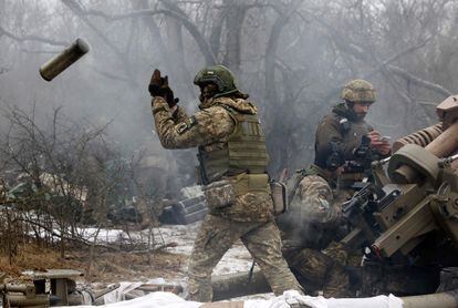 Ukrainian soldiers fire at Russian positions on the eastern front, in the Luhansk region, on January 16.