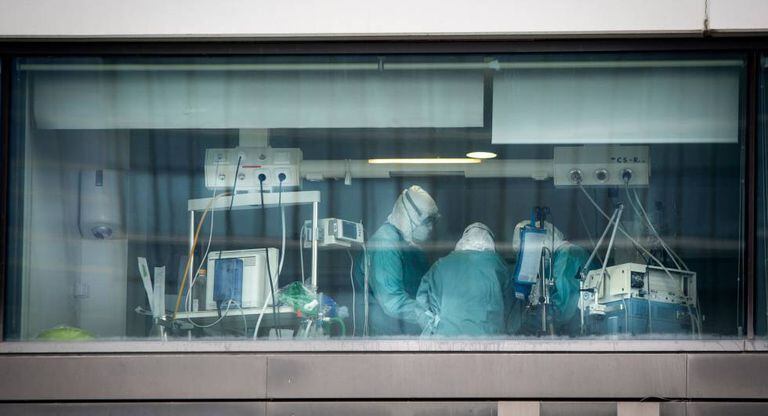 Healthcare workers in the intensive care unit of La Paz Hospital in Madrid.