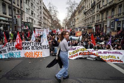 Students protest France's plans to raise the retirement age in Lyon, on March 9.