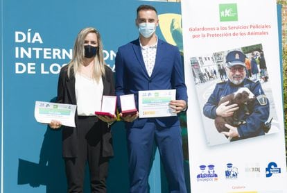 Flor Peña and Alberto Venera accepting their REPA awards on October 6.