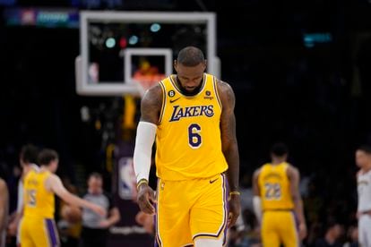 Los Angeles Lakers' LeBron James looks down in the closing minutes of a loss to the Denver Nuggets in the second half of Game 4 of the NBA basketball Western Conference Final series on May 22, 2023, in Los Angeles.