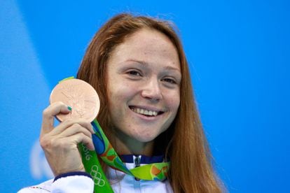 Aliaksandra Herasimenia of Belarus on the podium during the medal ceremony for the Women's 50m Freestyle at the Rio 2016 Olympic Games.