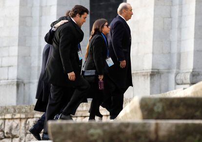 Members of the Franco family arrive at the basilica of the Valley of the Fallen.