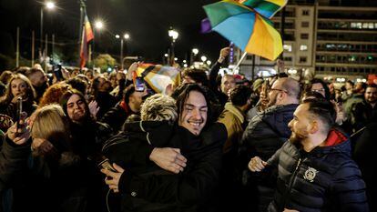 Members of the LGBTQ+ community and supporters celebrate in front of the Greek parliament, after approving same-sex civil marriages, in Athens, Greece, February 15, 2024.
