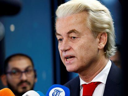 Dutch far-right politician and leader of the PVV party Geert Wilders reacts as he meets the press as parties' lead candidates meet to begin coalition talks in The Hague, Netherlands, November 24, 2023.