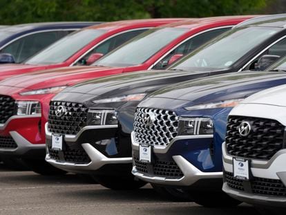 A line of 2022 Santa Fe SUV's sit outside a Hyundai dealership Sunday, Sept. 12, 2021, in Littleton, Colo.