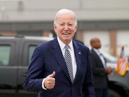 U.S. President Joe Biden gestures as he walks to board Air Force One, in New Castle, Delaware, U.S., October 30, 2023.