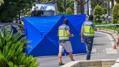 Police at a crime scene in Marbella, Spain, where a man was shot dead by a hitman in June.
